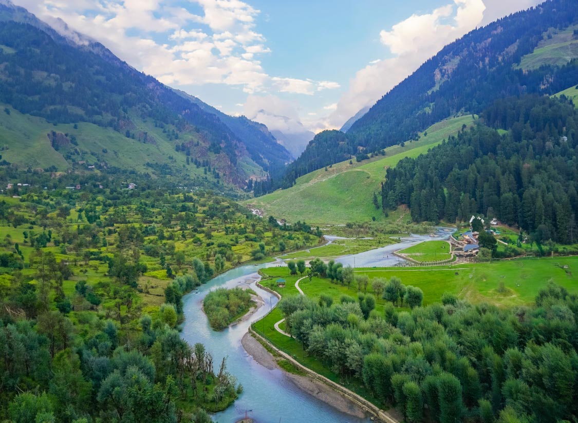 River and green slopes in Betaab Valley, Pahalgam